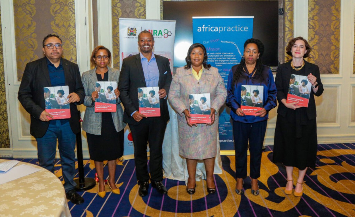 Partners pose for a photo during the launch of the Policy Guide for Digital Economy progress.